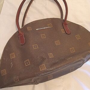 Brown Duffel Bag with Crescent Shape and Textured Design